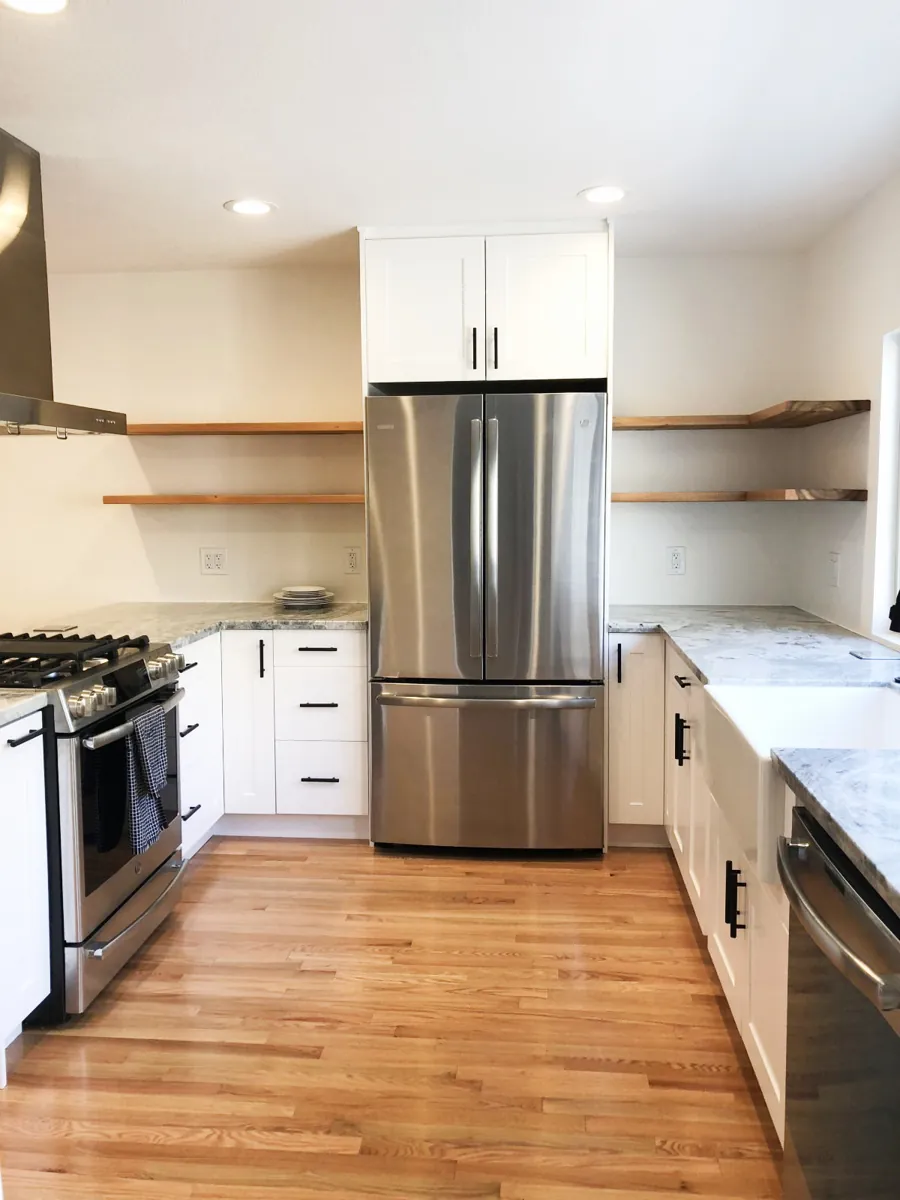 Nordic white kitchen with oak floating shelves