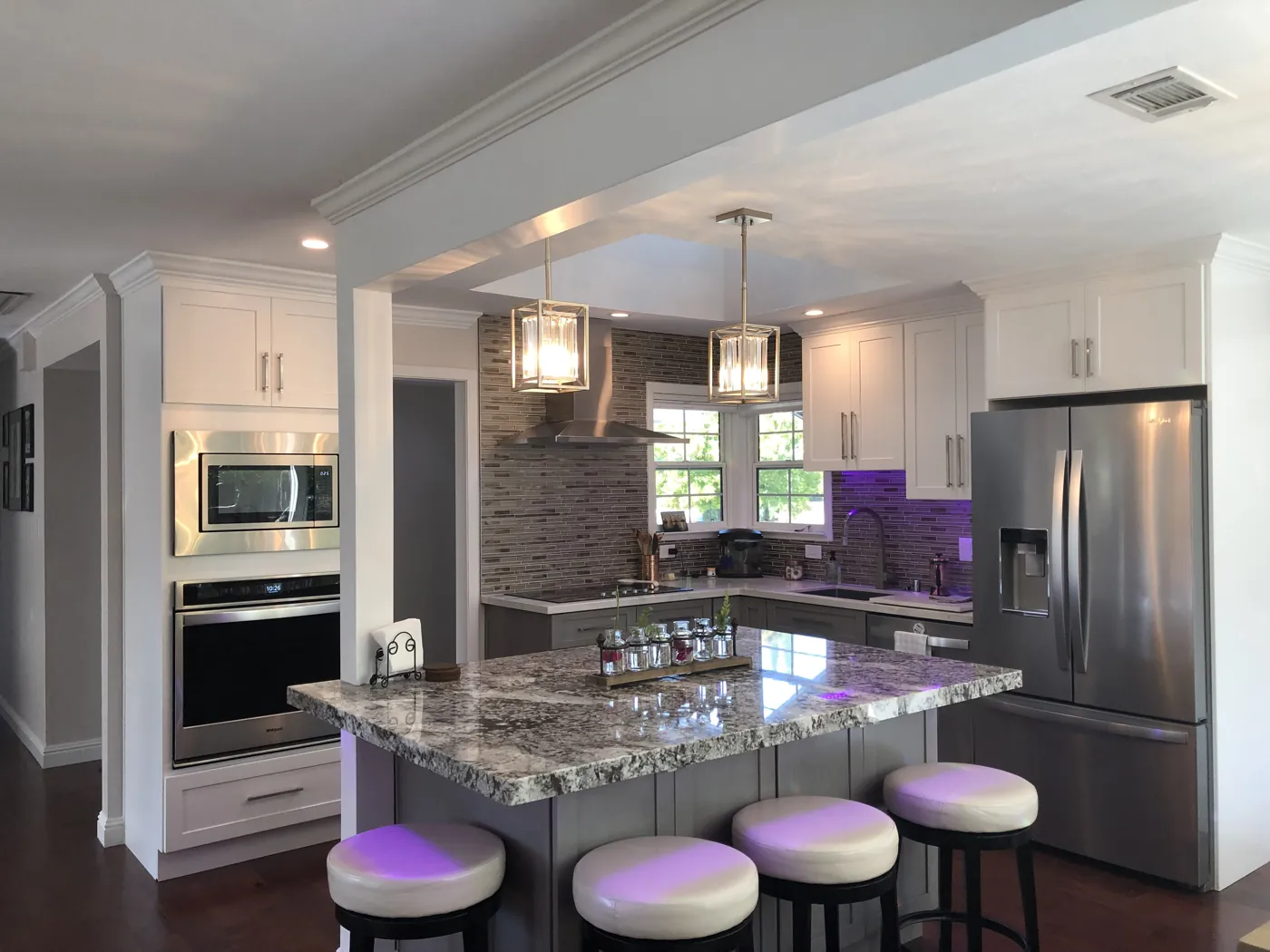 Kitchen with granite island and bar seating
